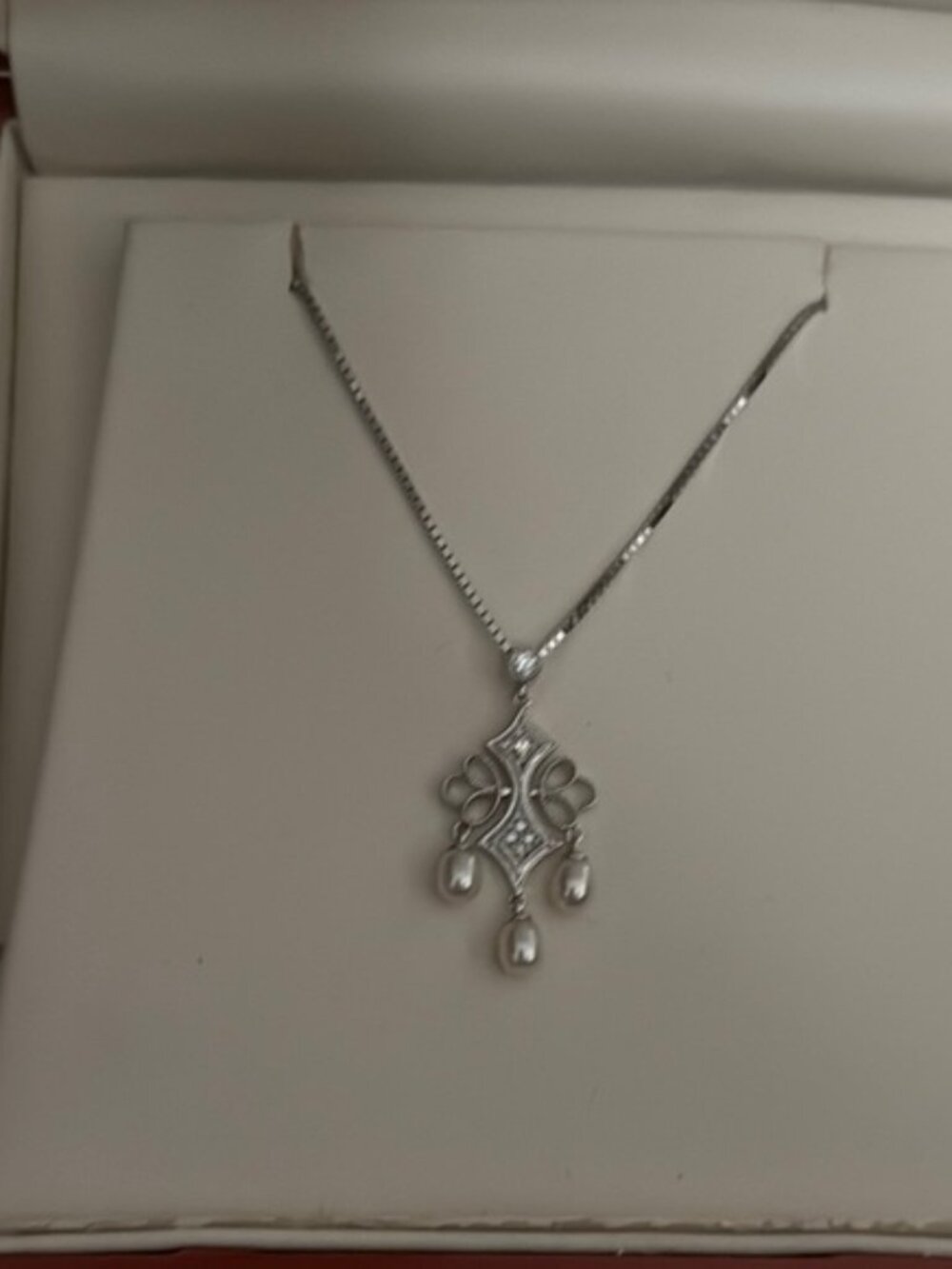 Elegant Silver Necklace with Pearl Accents